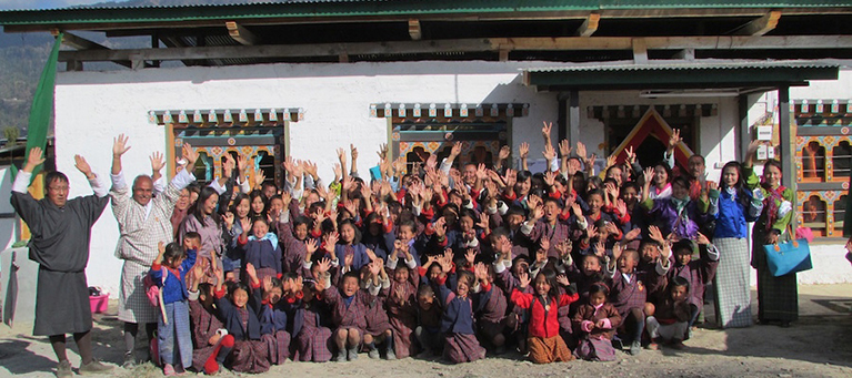 Community members celebrate opening a new READ Center in Bhutan