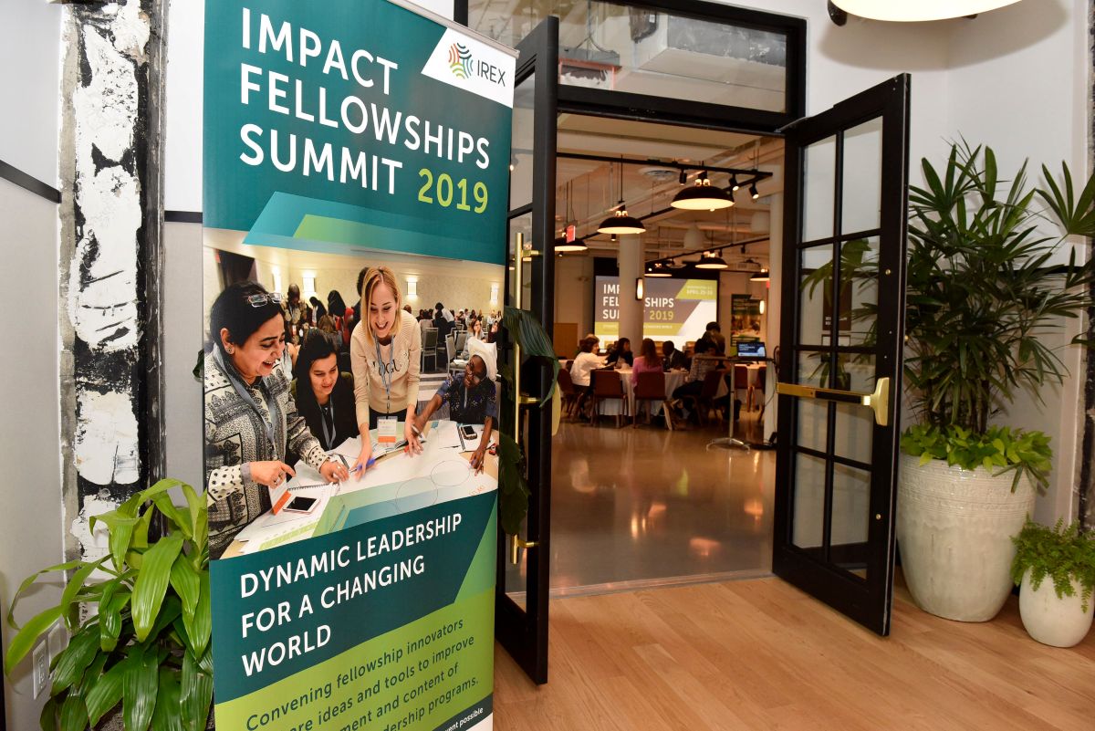 Impact Fellowships Summit sign