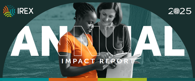 Photo featuring two individuals reviewing documents, overlaid with white text reading "ANNUAL IMPACT REPORT"