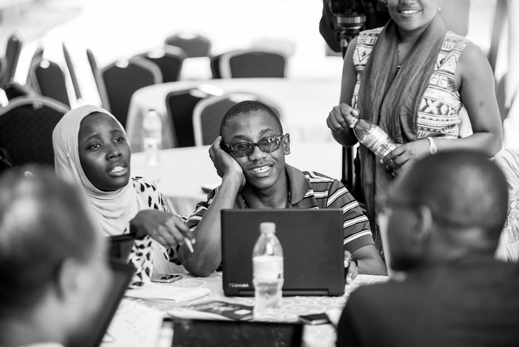 A group of students sitting around a table during data literacy training supported by the DataZetu program