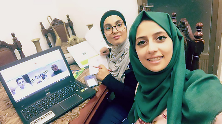 Jordanian students collaborating