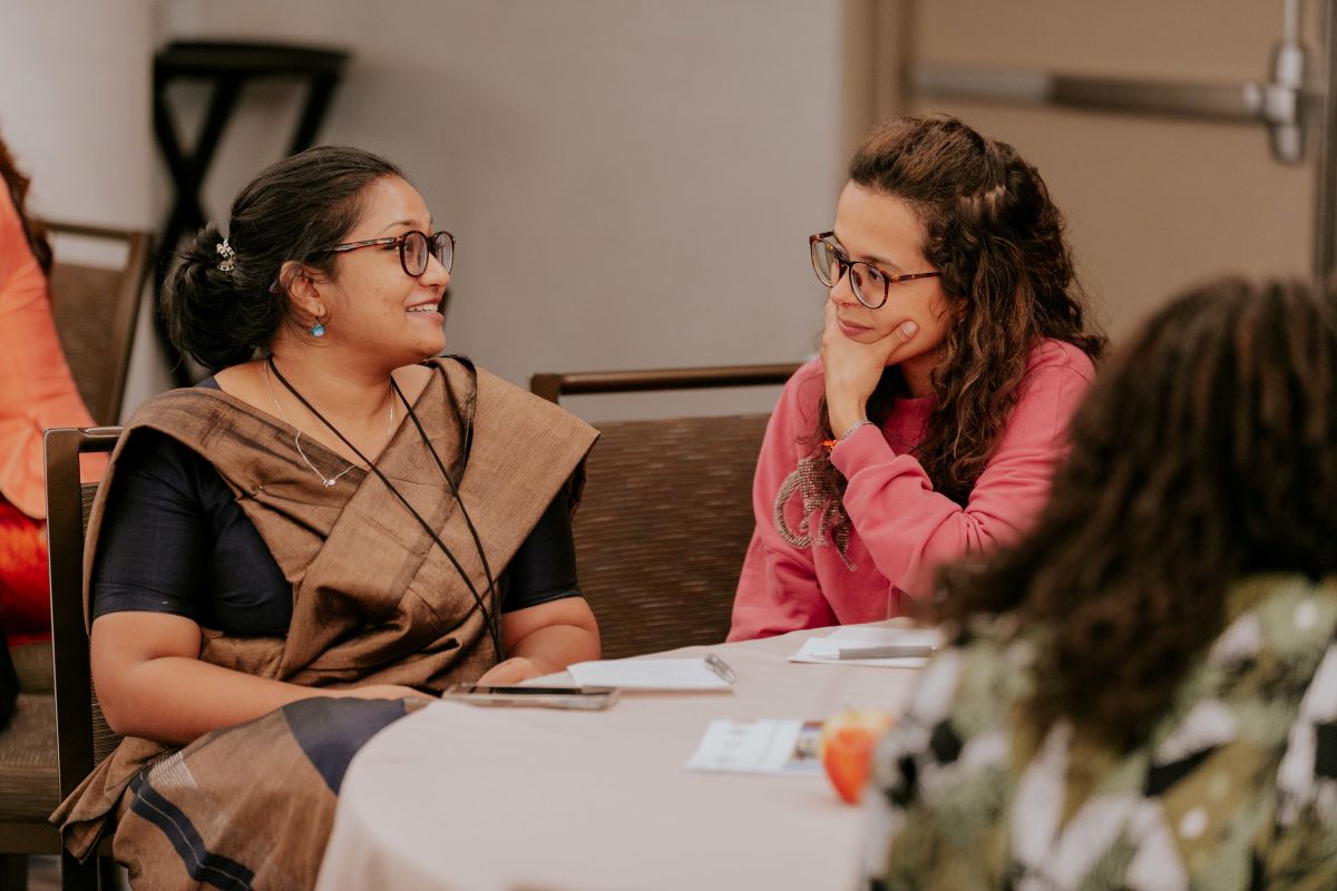Two people sitting at a table