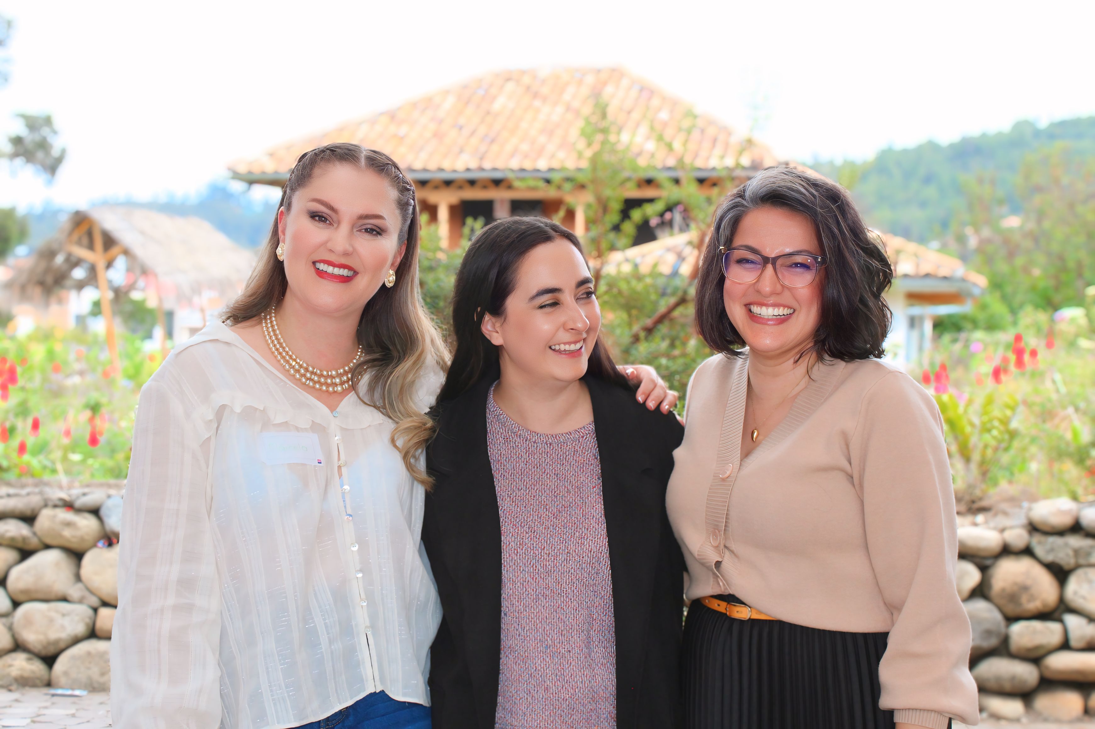 Photo of three women smiling