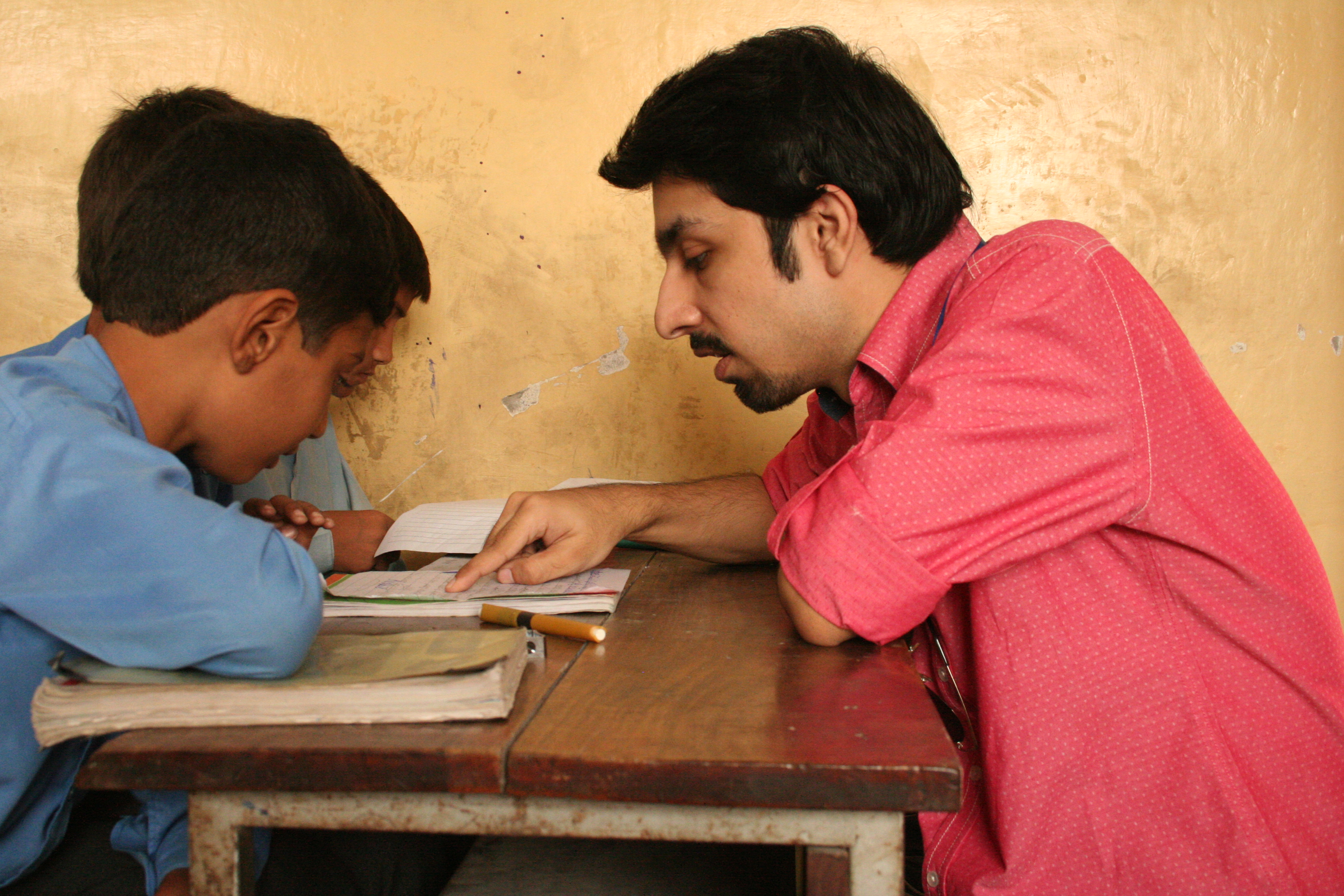 Mujtaba reading with children