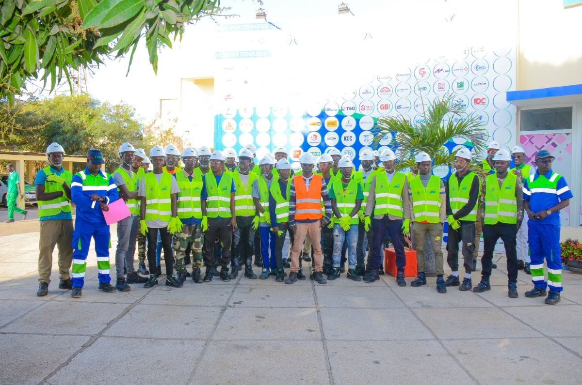 A group of technical workers in training