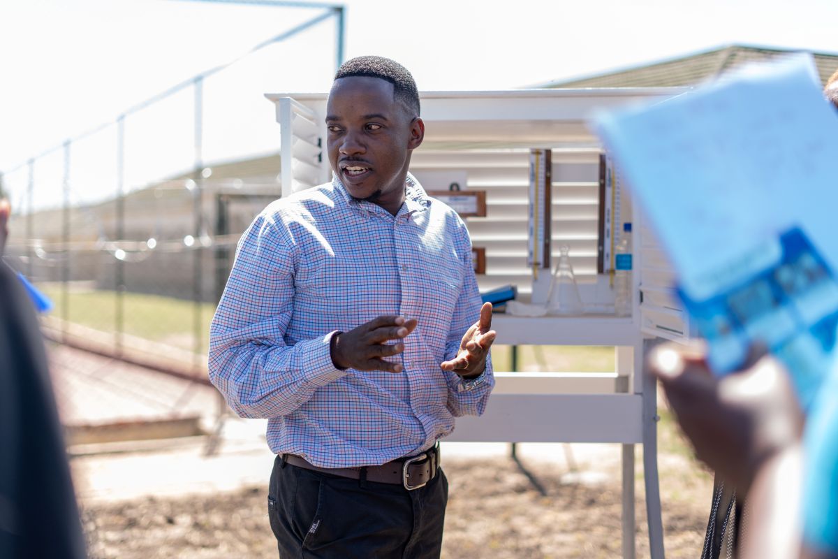 Freedom Mukanga outside speaking