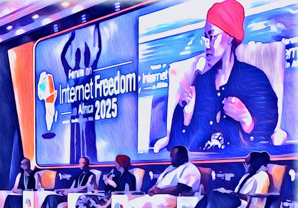 A group of five panelists on stage