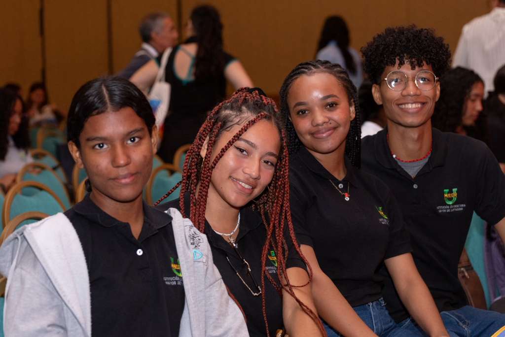 Four students smiling
