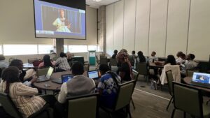 Fellows hosted by Wayne State University gather for a Summit Watch Party in Detroit, Michigan.