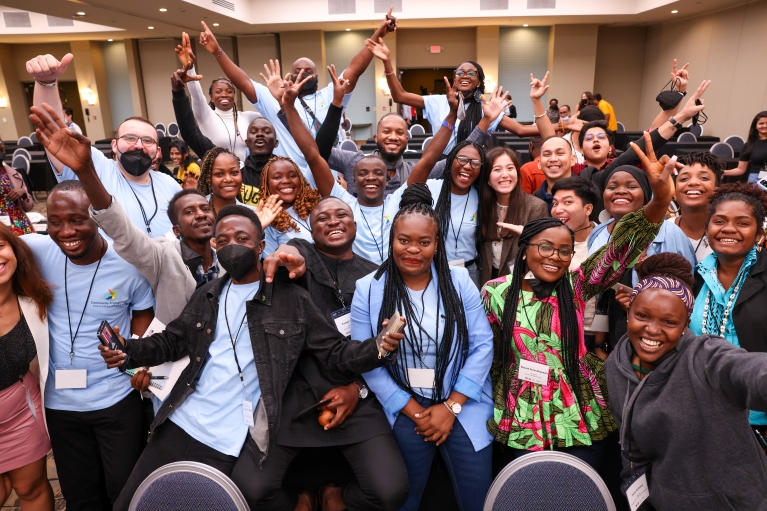 A group of young people cheering