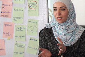 Two women conducting a training session in Jordan
