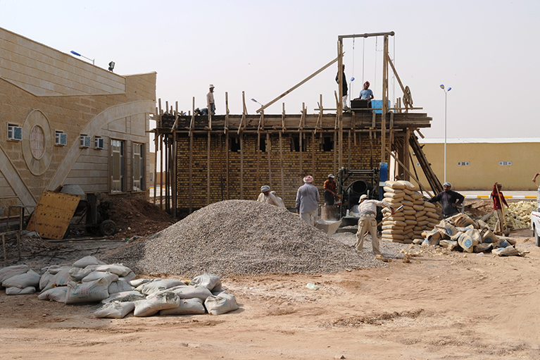 Iraqi workers building facilities in Iraq