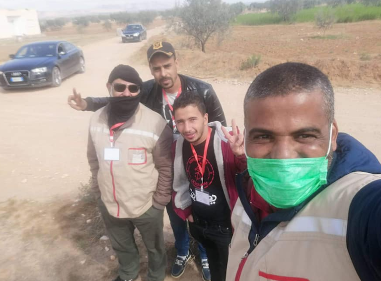 Ma3an youth Houssem and other local crisis unit members spread news of COVID-19 to residents residing outside of the Souk Jedid community center