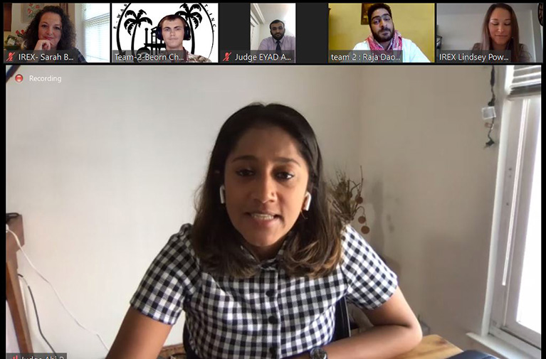Screenshot from a video conference with six people.