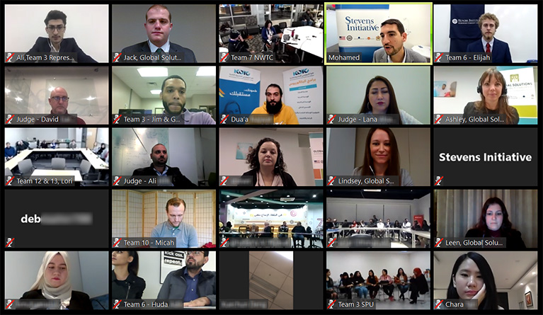 Screenshot of a video conference. The screenshot shows the participants in a 5-by-5 grid.