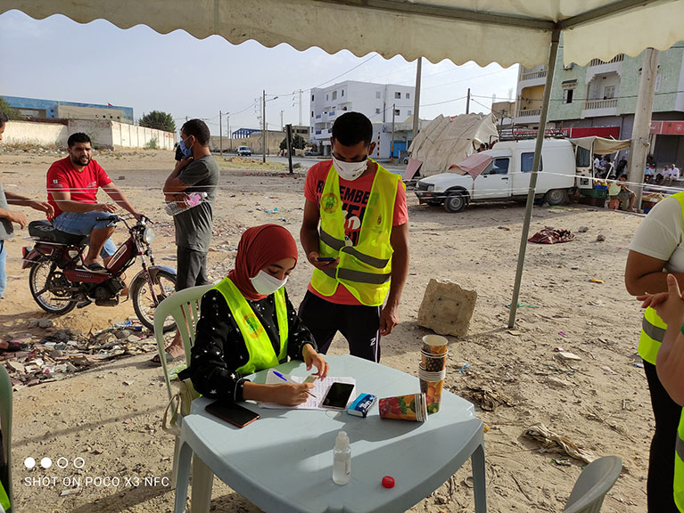 Youth in Tunisia registering people for COVID-19 vaccinations.