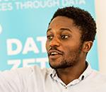 A leader talking to a group in Tanzania