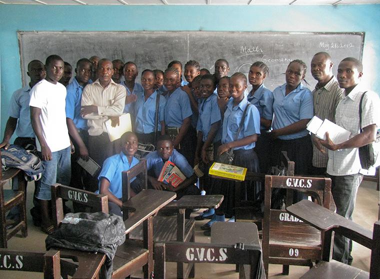 Teacher and students in a classroom in Africa